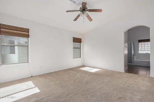 2268 S 162nd Ln, Goodyear, AZ 85338 - carpeted spare room with arched walkways, ceiling fan, baseboards, and visible vents