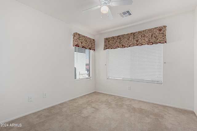 2268 S 162nd Ln, Goodyear, AZ 85338 - spare room with visible vents, a ceiling fan, baseboards, and carpet floors
