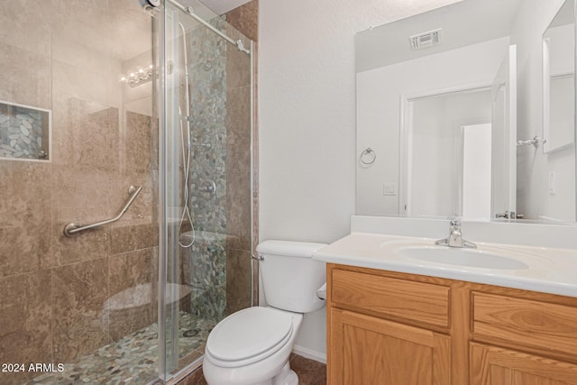 2268 S 162nd Ln, Goodyear, AZ 85338 - full bathroom featuring toilet, vanity, a shower stall, and visible vents