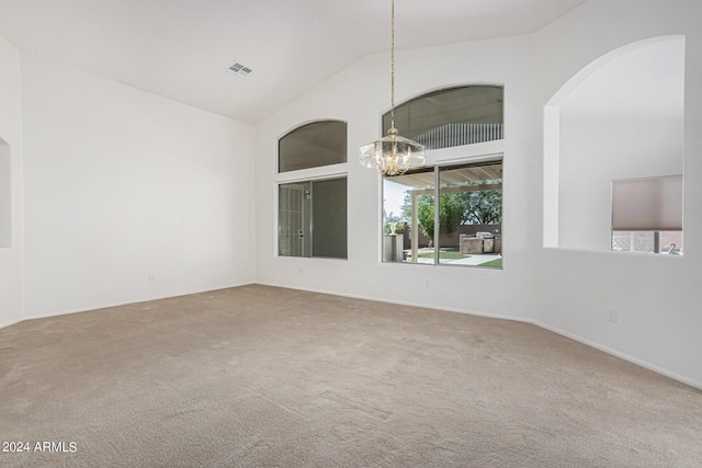 2268 S 162nd Ln, Goodyear, AZ 85338 - carpeted spare room featuring visible vents, baseboards, an inviting chandelier, arched walkways, and vaulted ceiling