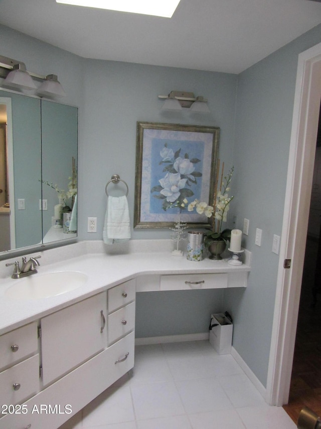 bathroom with vanity and tile patterned floors