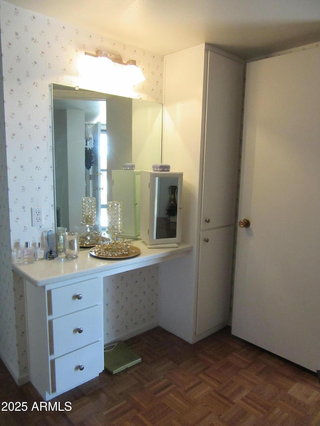 bathroom featuring parquet flooring