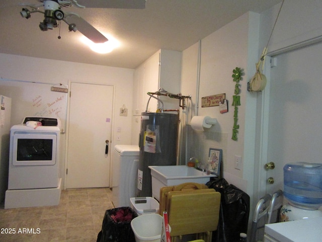 washroom featuring washer / clothes dryer, sink, and electric water heater