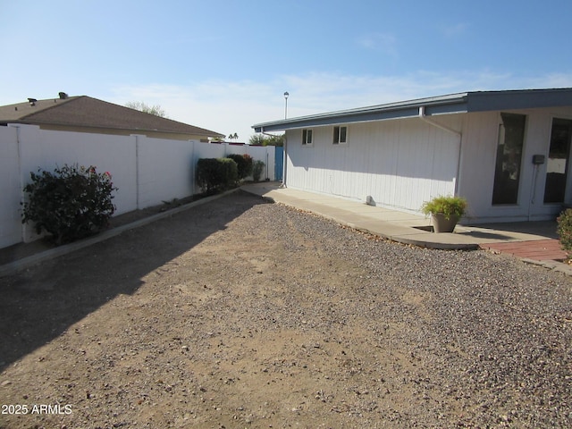 back of house with a patio area