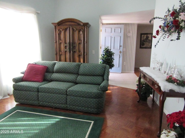 living room featuring parquet floors