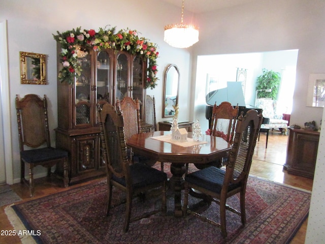 dining area featuring hardwood / wood-style floors