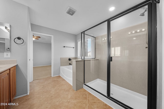 bathroom with tile patterned floors, vanity, separate shower and tub, and ceiling fan