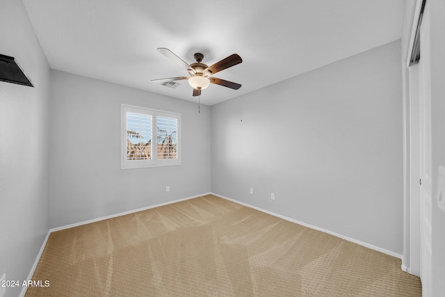 unfurnished bedroom featuring carpet flooring and ceiling fan