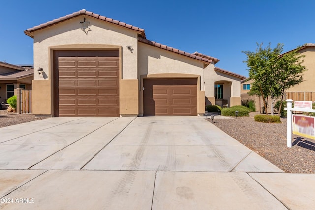 view of front of property with a garage