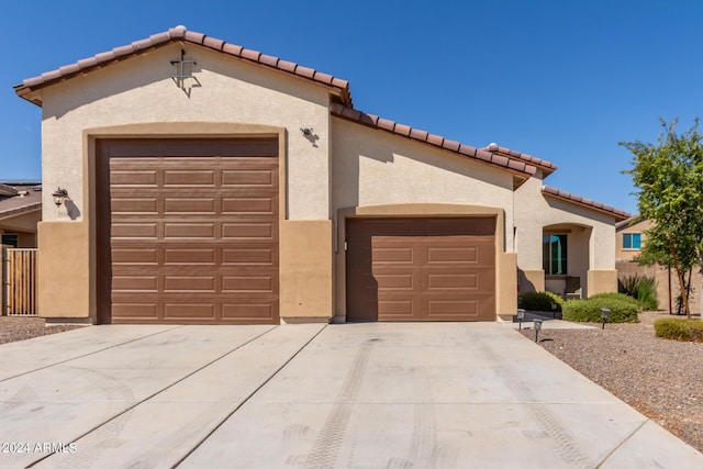 view of front of property featuring a garage