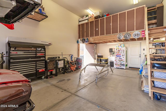 garage with a workshop area