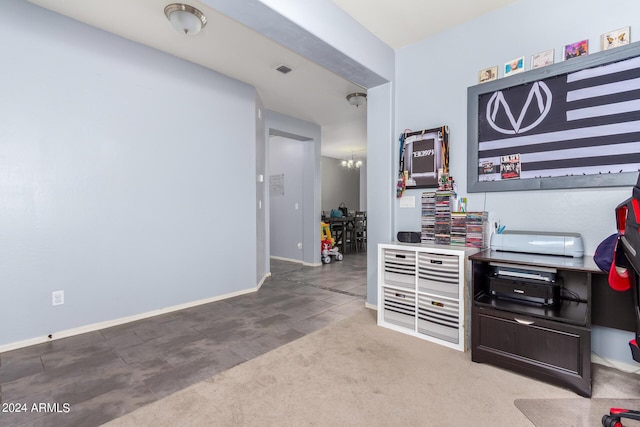 office area featuring a notable chandelier