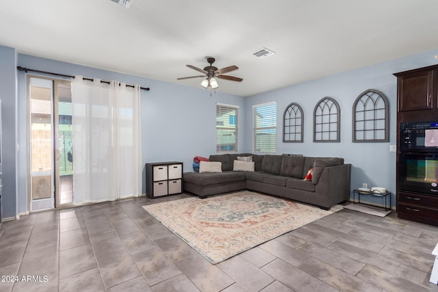 living room with ceiling fan