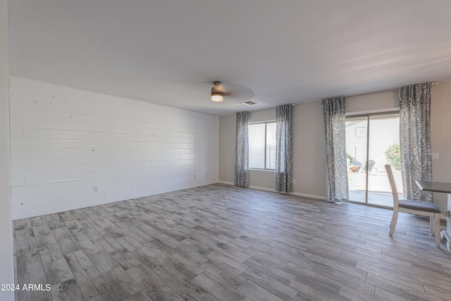 spare room with light wood-type flooring