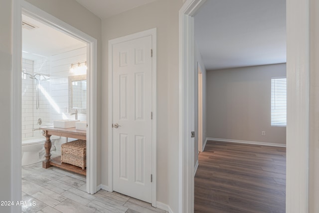 hallway featuring light hardwood / wood-style floors