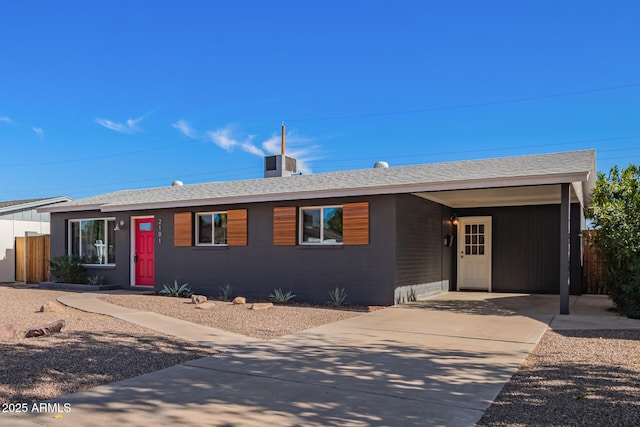 single story home with a carport