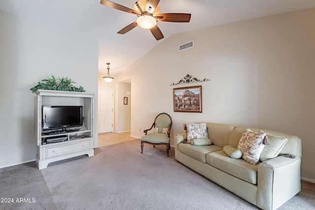 carpeted living room featuring ceiling fan and lofted ceiling