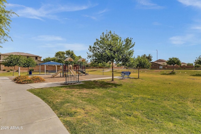 exterior space featuring a playground and a lawn