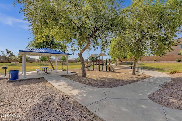 view of play area with a gazebo and a lawn