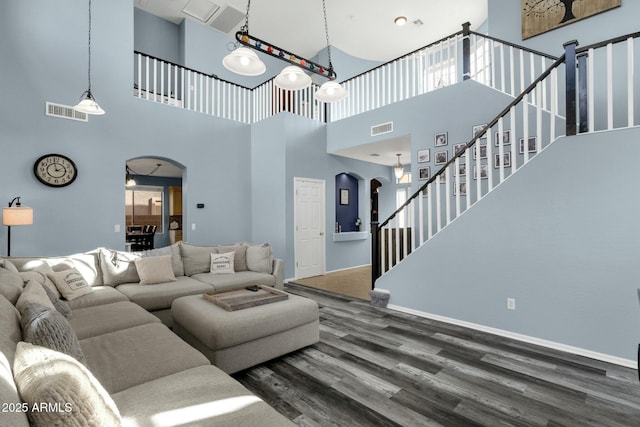living room with dark wood-type flooring