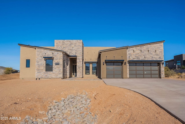 view of front of property with a garage