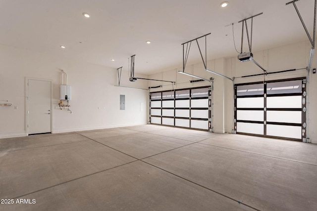 garage featuring a garage door opener, electric panel, and tankless water heater