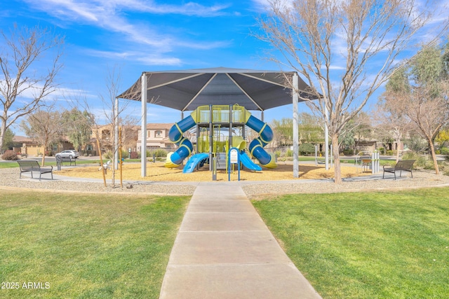 communal playground featuring a lawn