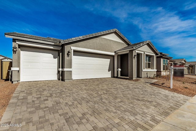 ranch-style home with a garage