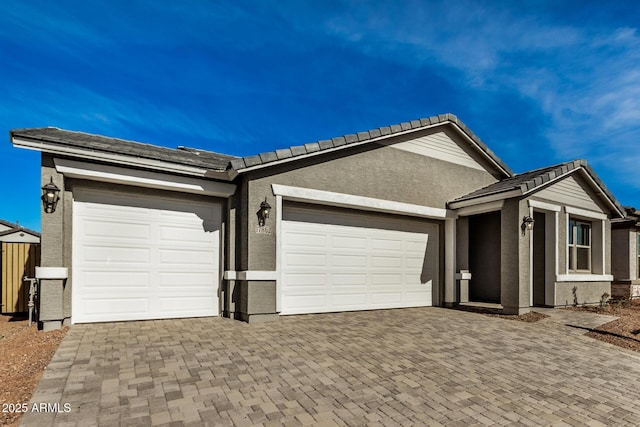 ranch-style home with a garage