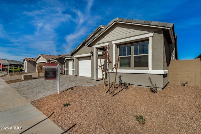 view of front of home with a garage