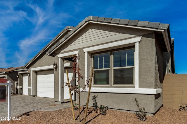 view of front of home with a garage