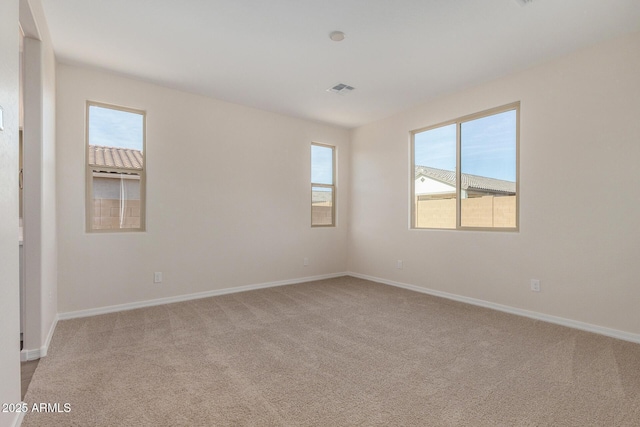 view of carpeted spare room