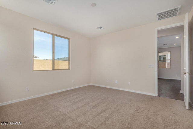 view of carpeted spare room