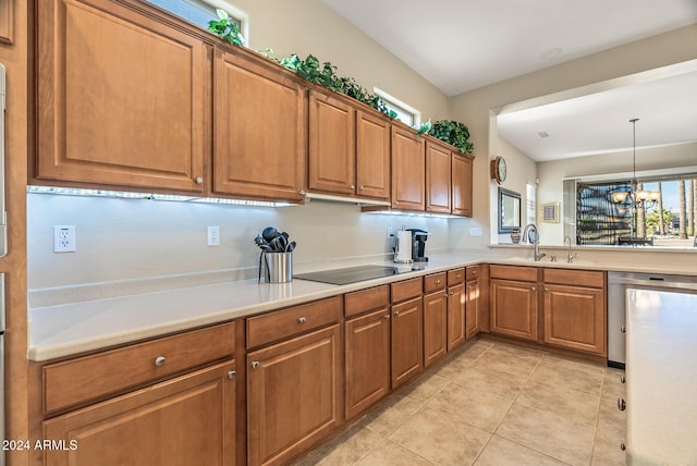 kitchen featuring black electric stovetop, sink, light tile patterned floors, decorative light fixtures, and a notable chandelier