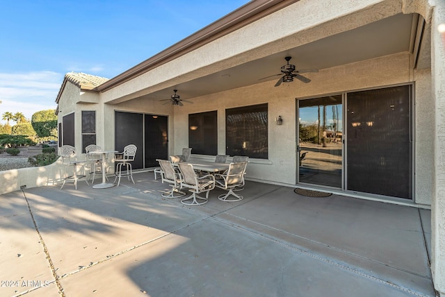 view of patio / terrace featuring ceiling fan