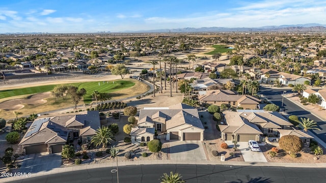 birds eye view of property featuring a mountain view