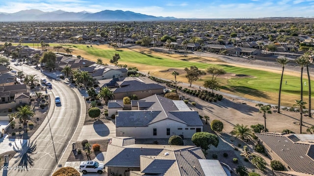 birds eye view of property with a mountain view