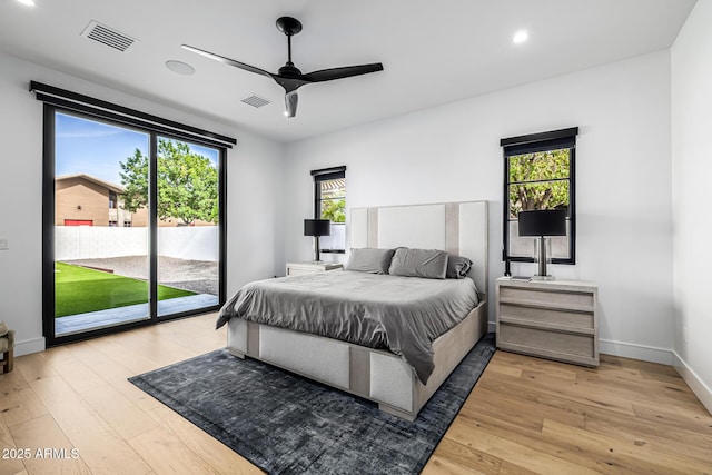 7851 N Central Ave, Phoenix, AZ 85020 - bedroom featuring access to outside, light wood-style flooring, recessed lighting, baseboards, and ceiling fan