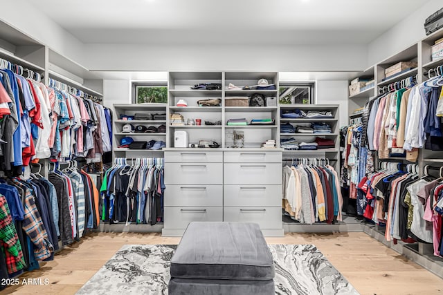 7851 N Central Ave, Phoenix, AZ 85020 - walk in closet featuring light wood-type flooring
