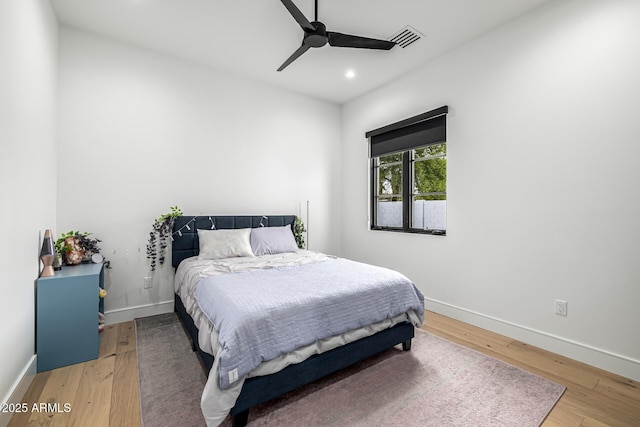 7851 N Central Ave, Phoenix, AZ 85020 - bedroom with light wood-style floors, recessed lighting, baseboards, and ceiling fan
