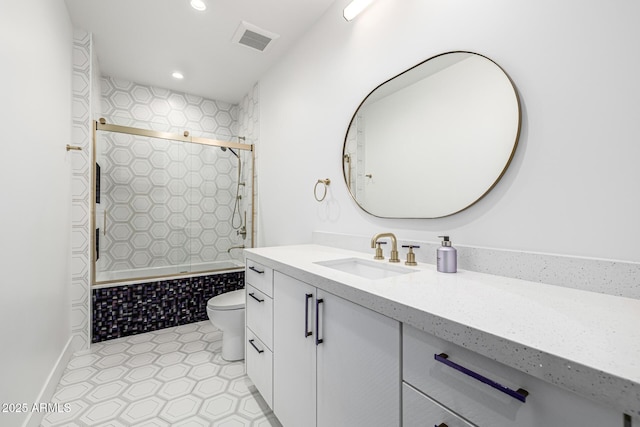 7851 N Central Ave, Phoenix, AZ 85020 - bathroom featuring toilet, vanity, tiled shower / bath combo, and recessed lighting