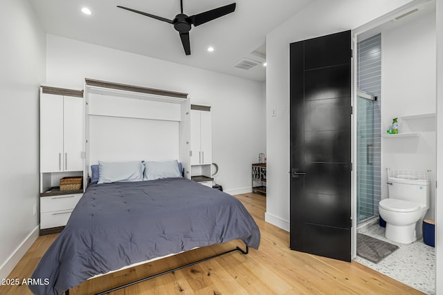 7851 N Central Ave, Phoenix, AZ 85020 - bedroom featuring light wood-style floors, baseboards, recessed lighting, and connected bathroom