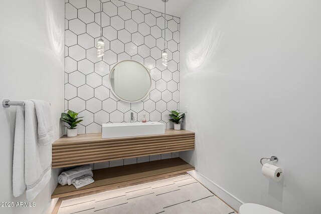 7851 N Central Ave, Phoenix, AZ 85020 - bathroom featuring toilet, vanity, and baseboards