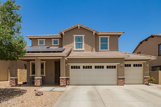 7858 W Fetlock Trl, Peoria, AZ 85383 - traditional home featuring stone siding, stucco siding, solar panels, concrete driveway, and a porch