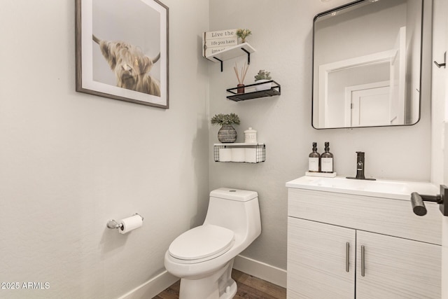 7858 W Fetlock Trl, Peoria, AZ 85383 - half bathroom featuring vanity and wood finished floors