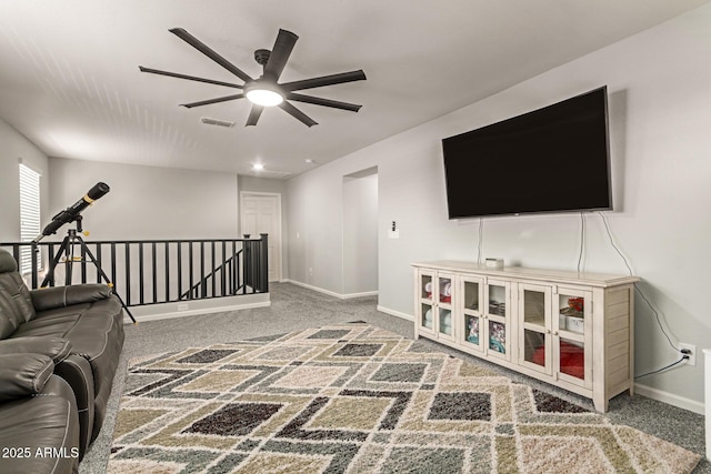 7858 W Fetlock Trl, Peoria, AZ 85383 - carpeted living room featuring a ceiling fan and baseboards