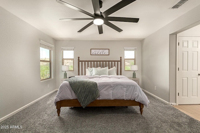 7858 W Fetlock Trl, Peoria, AZ 85383 - bedroom with a ceiling fan and baseboards