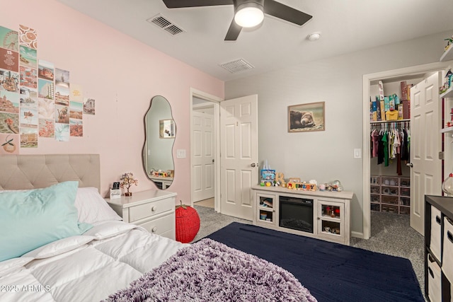 7858 W Fetlock Trl, Peoria, AZ 85383 - bedroom with carpet flooring, a spacious closet, a closet, and ceiling fan