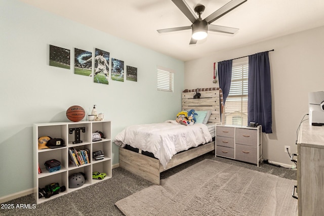 7858 W Fetlock Trl, Peoria, AZ 85383 - carpeted bedroom with ceiling fan and baseboards