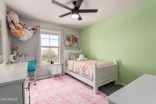7858 W Fetlock Trl, Peoria, AZ 85383 - carpeted bedroom with baseboards and ceiling fan